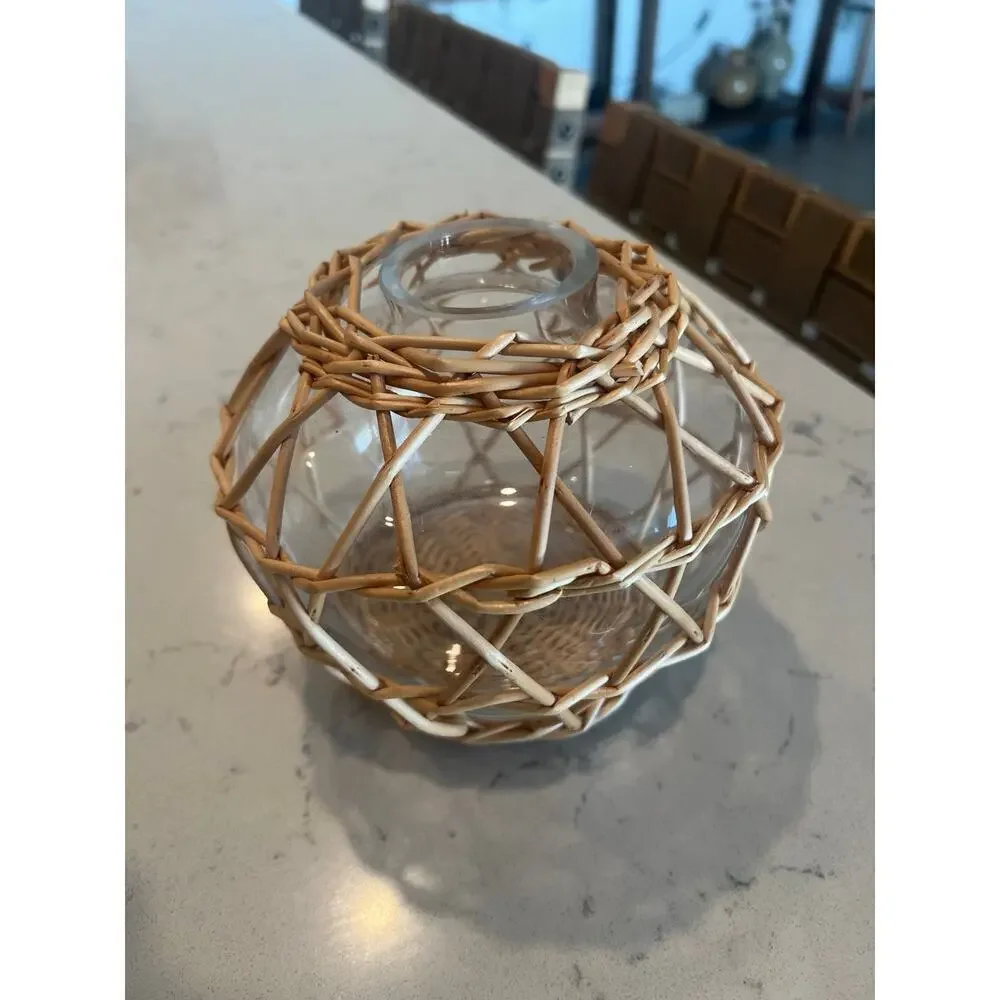 Small glass and wicker vase